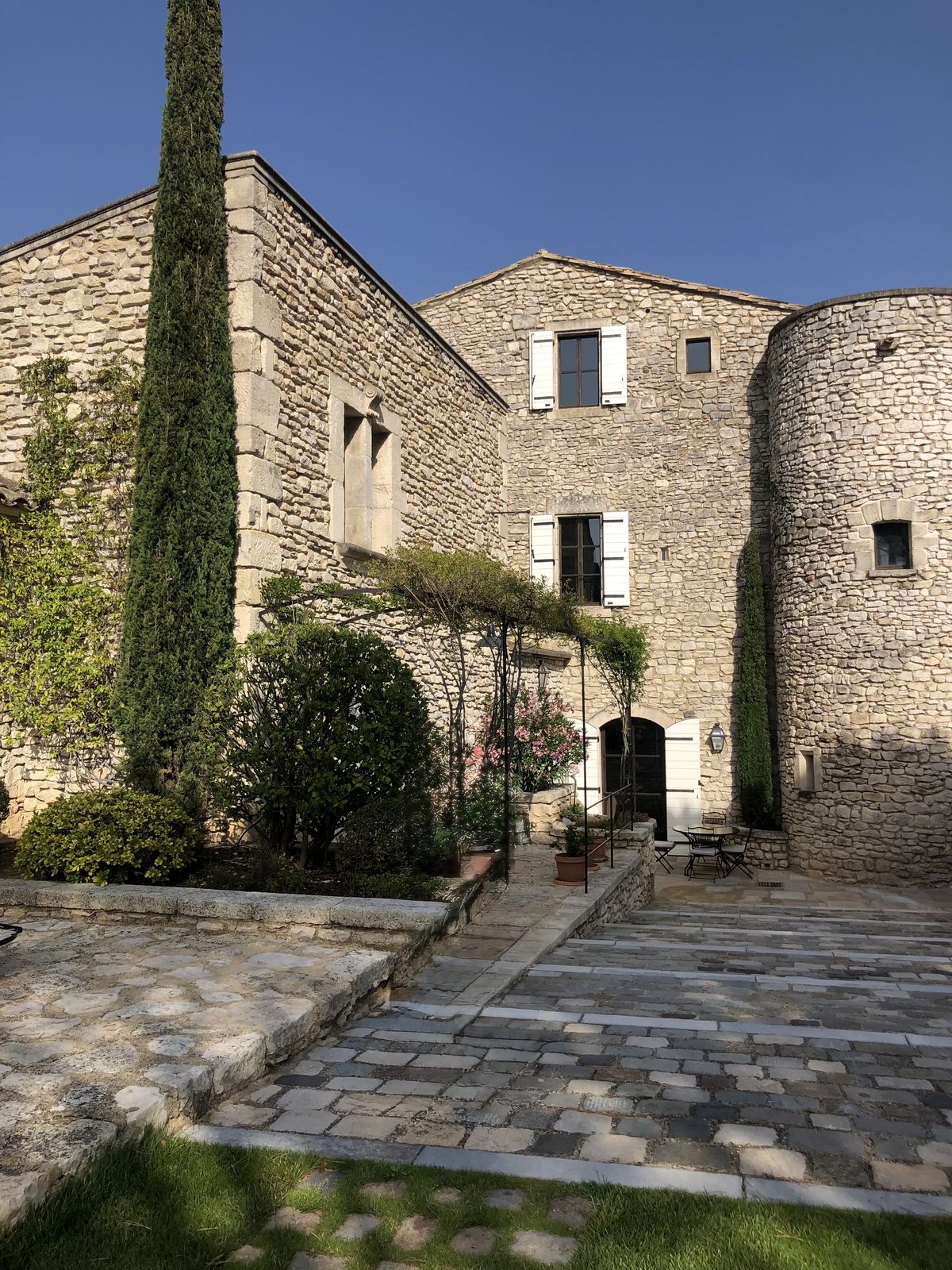 Stone Provençal residence with cypress trees